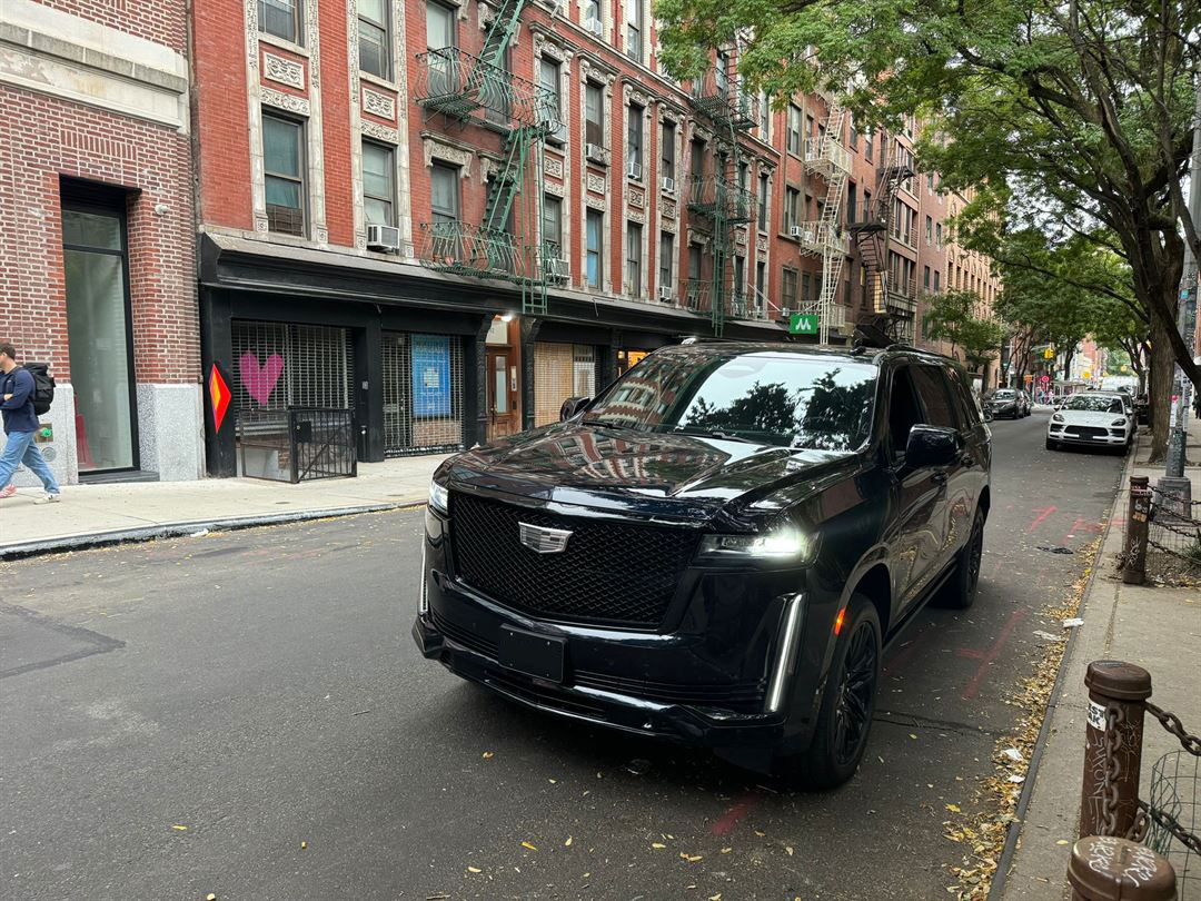 Black Cadillac SUV on a New York City street for private black car service
